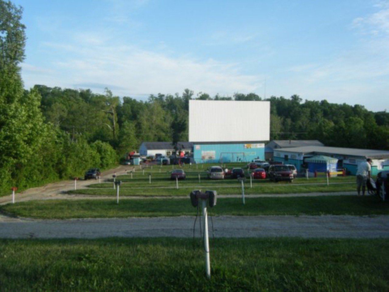 Georgetown Drive-In
8200 State Road 64Originally opened in 1951, this double-screen theater in Georgetown, IN hosts double features on both screens at the same time. This theater also has traditional speakers to attach to your car if you want the classic drive-in experience from decades ago. Every row in this theater is higher than the row in front, so you will always have a place to see either screen.