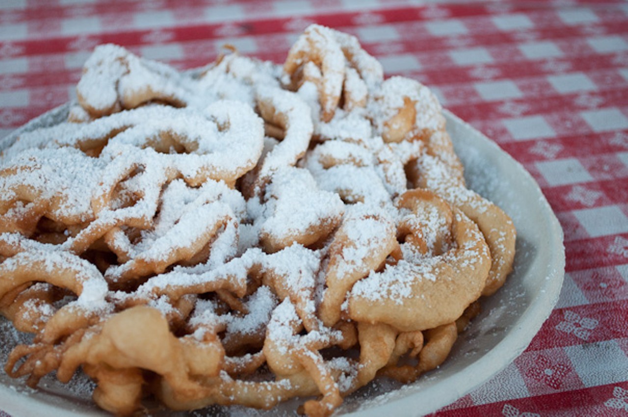 Funnel Cake
For all our sweet tooths out there, the funnel cake is a delicious and no-so-nutritious dish that may leave you with a tummy ache. But it feels so good to eat in the moment. The Chow Wagon is practically a mini vacation, so the calories don’t count anyway.