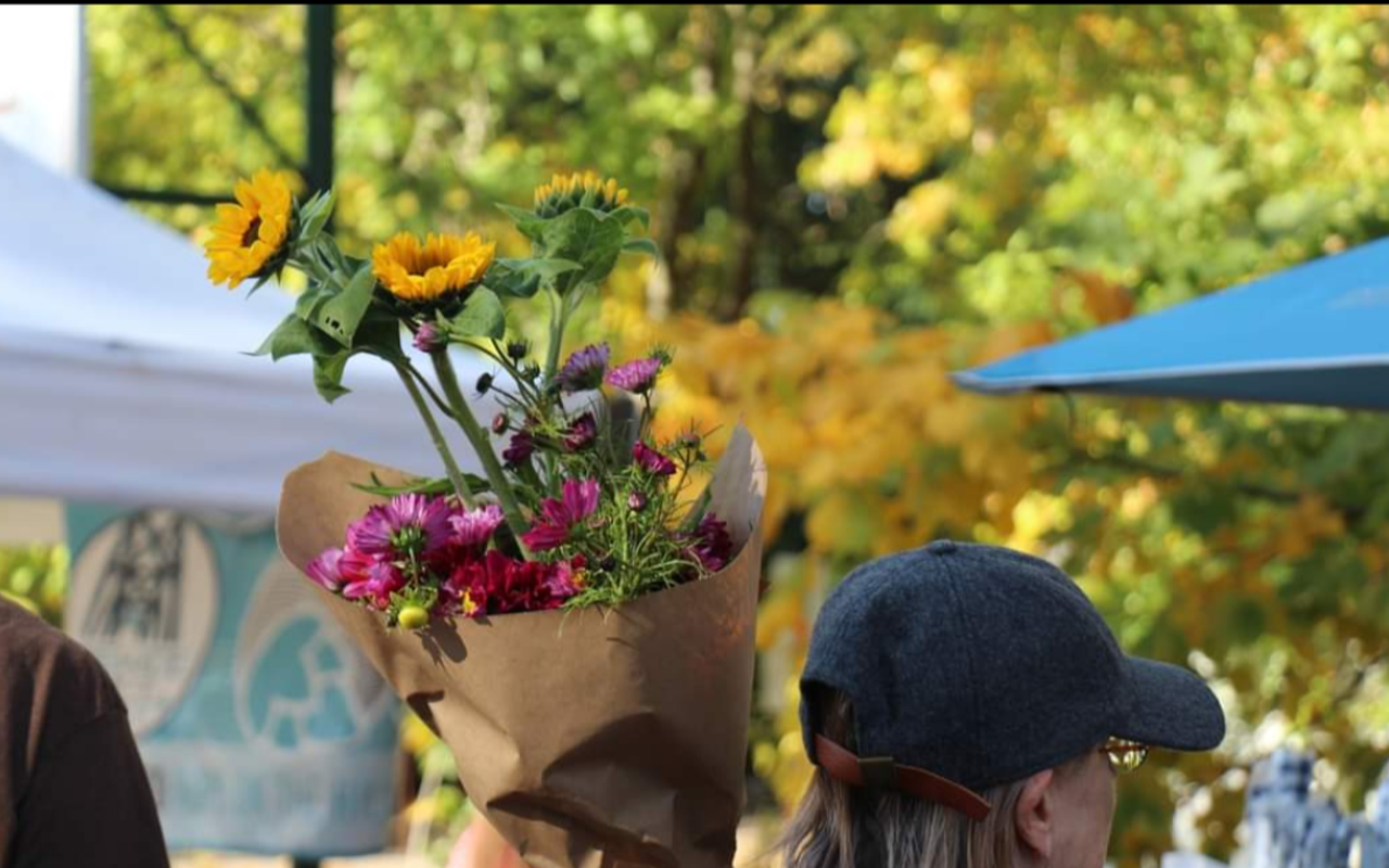 Fresh flowers and fresh food are always found at the Douglass Loop Farmers Market.