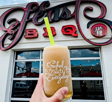 Ale8 Bourbon Slushie
Feast BBQ 
900 E. Market St. #100
When two Kentucky classics meet, magic is made! Available all year, the Ale8 Bourbon Slushie from Feast BBQ is a cult classic -- cold, creamy, and the perfect contrast to a plate of sticky-sweet Kentucky BBQ. If you want to shake things up, the BBQ joint also has a special "Slushie of the Month" with creative combinations like Chocolate Covered Cherry, Vanilla Cream Slushies, and even non-alcoholic specials like the seasonal Bourbon Street Hurricane Slushie!—Sydney Catinna