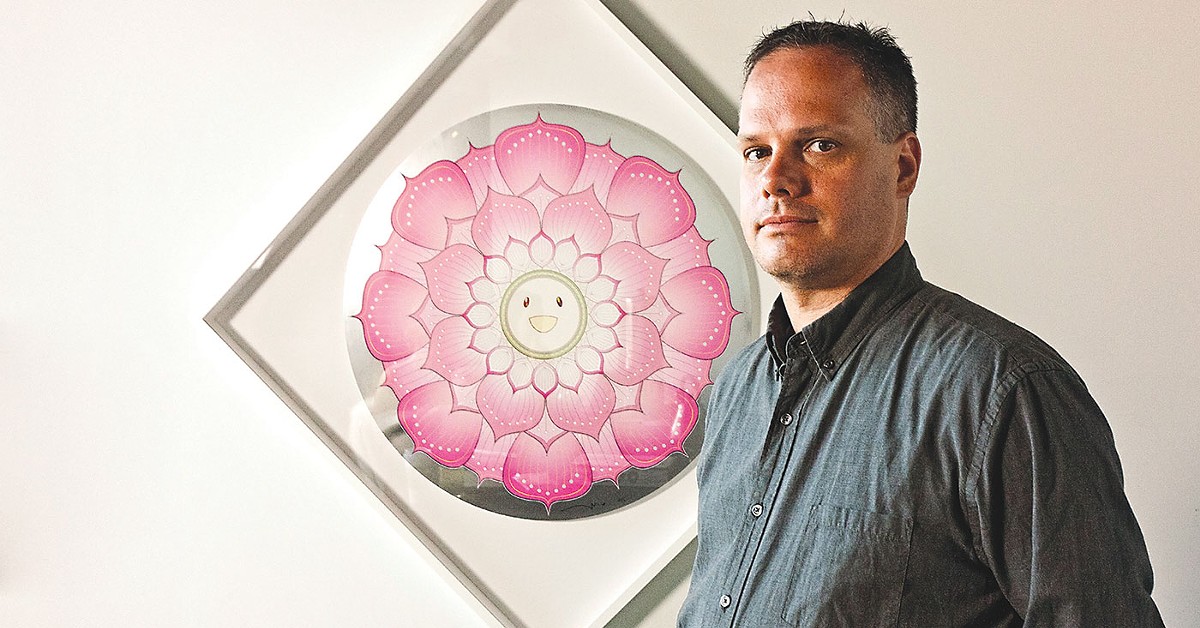 Jason Clark with  piece from his collection titled 'Lotus Flower Pink' by Takashi Murakami