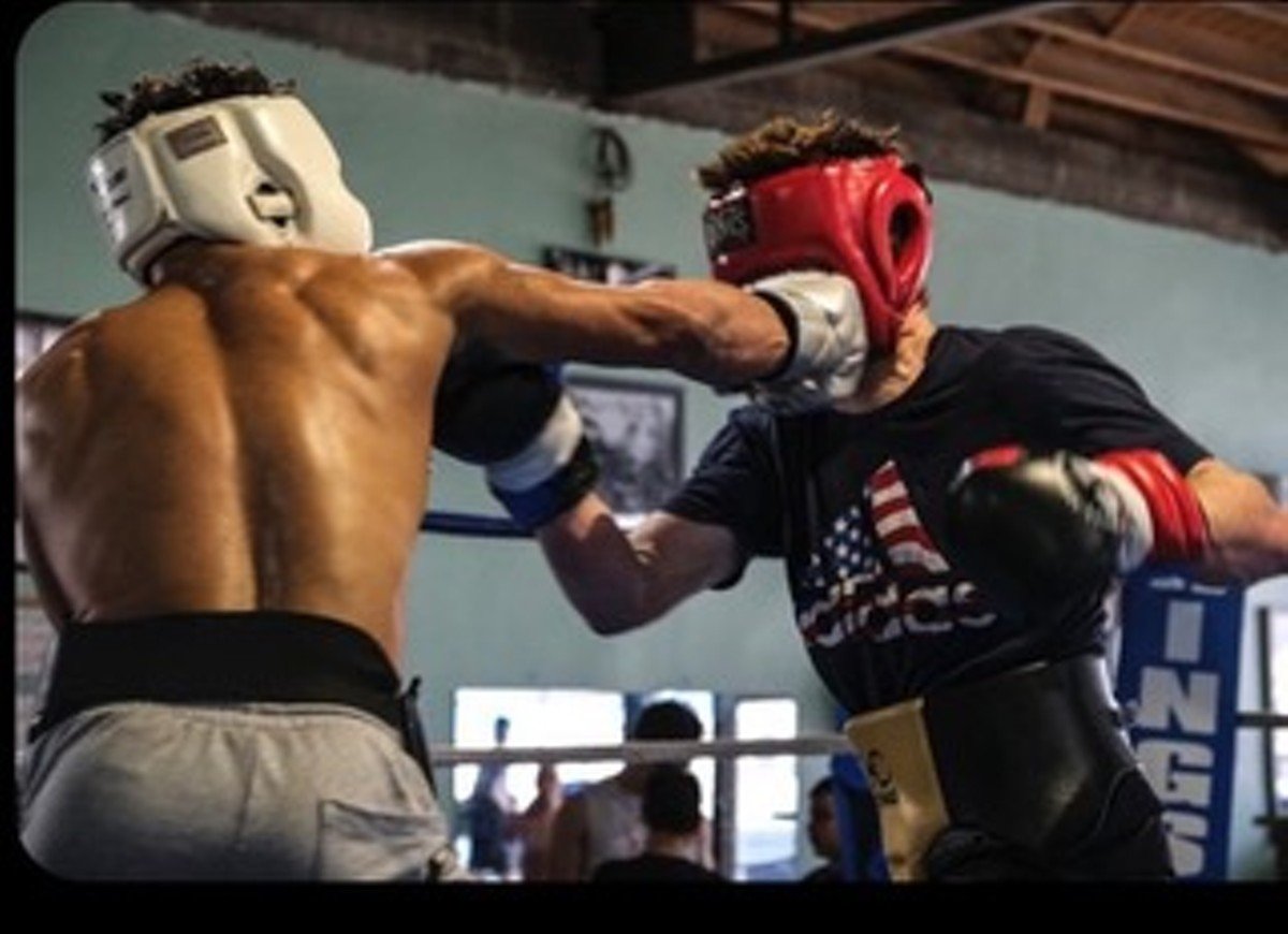Action photos of boxer Aaron Kiael Waldon, left, provided by Adam DelGiudice.