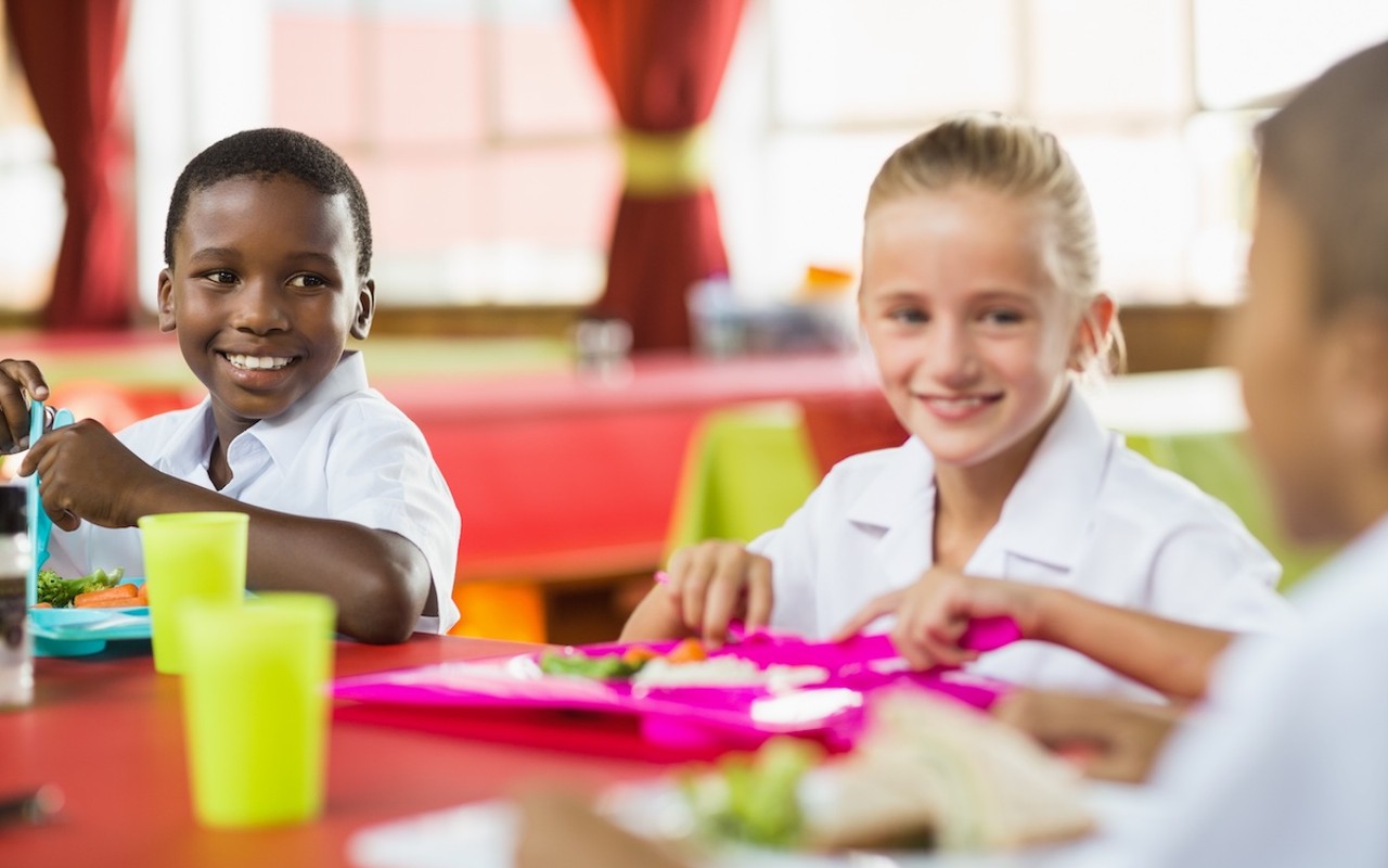 Children having lunch in school cafeteria