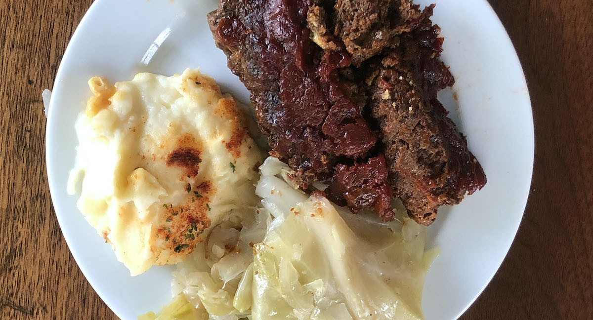Tender, soft, and plenty of it, sauced with a vinegary barbecue-style tomato sauce: That's Big Momma's meatloaf. We took mashed potatoes and cabbage on the side.