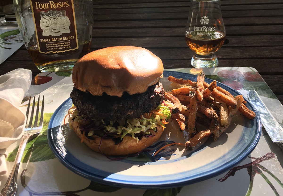 Bourbon&#146;s Burger from Bourbons Bistro with Four Roses, The Small Batch Select.  |  Photo by Susan Reigler.