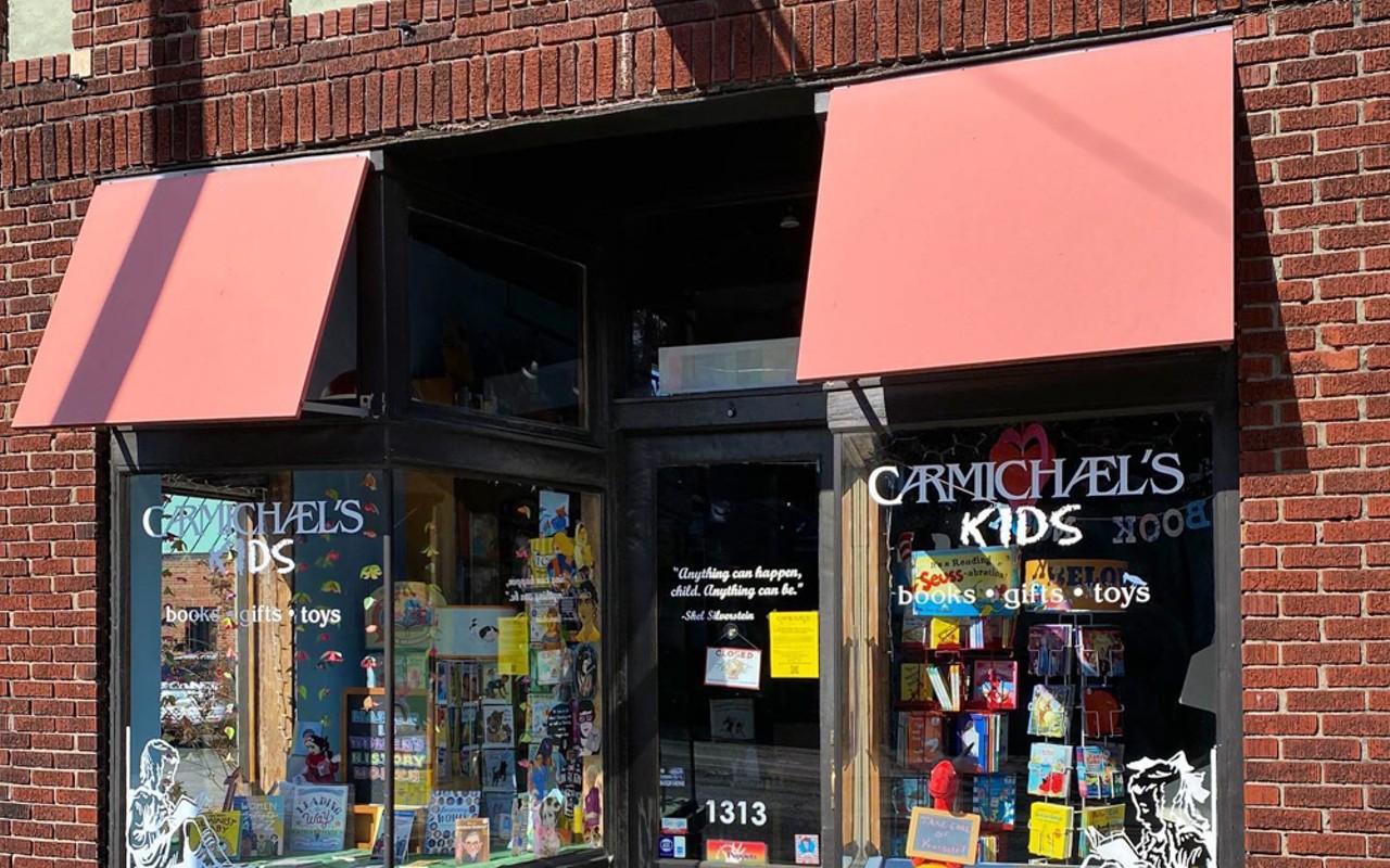 brick exterior of Carmichael's Kids, a bookstore