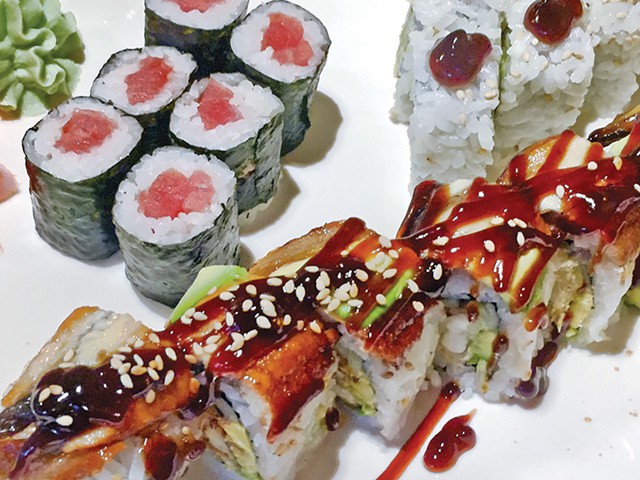 A sushi plate at Asahi: Dragon roll, tuna roll and AAC roll