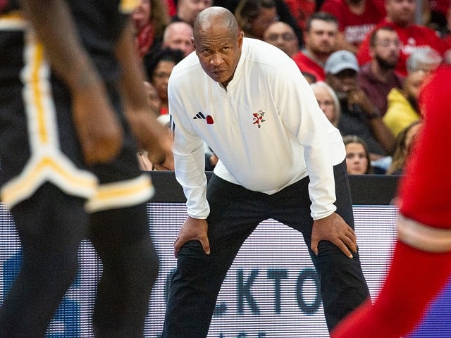 Coach Kenny Payne watches the UofL vs. UMBC men's basketball game at the KFC Yum! Center on Nov. 6, 2023.