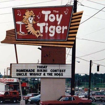 Toy TigerThe Toy Tiger was a rock & roll and general entertainment club that many of us thought was a store. (I mean, you get it, right?) It operated from 1973 to 1999 at the corner of Bardstown Road and Goldsmith Lane. While their wet t-shirt contests are now a thing of the past, if you’re lucky, you can find one of their t-shirts hanging around a local vintage shop.