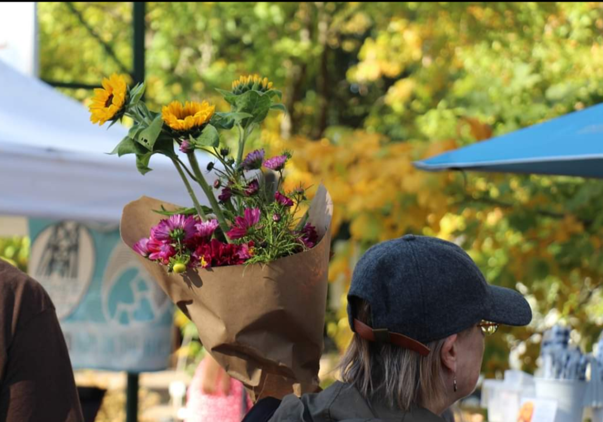 Fresh flowers and fresh food are always found at the Douglass Loop Farmers Market.