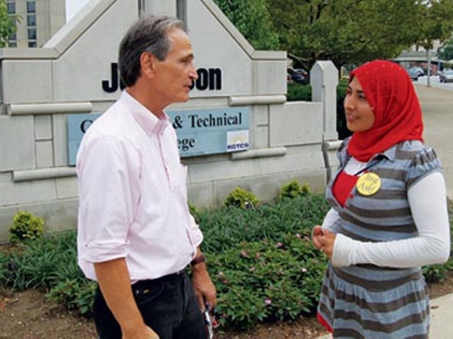 Marc Cummings speaks with Shaminah Paghmani, an ESL student at JCTC.