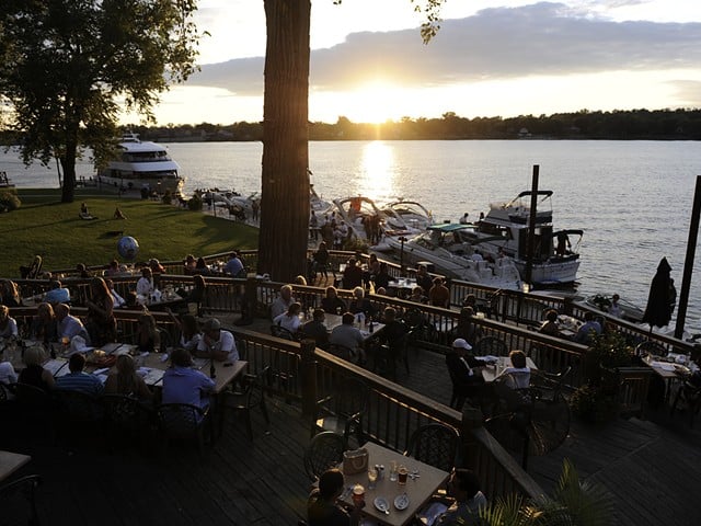 Summer sunset seen from the popular riverside alfresco terraces at Captain's Quarters.