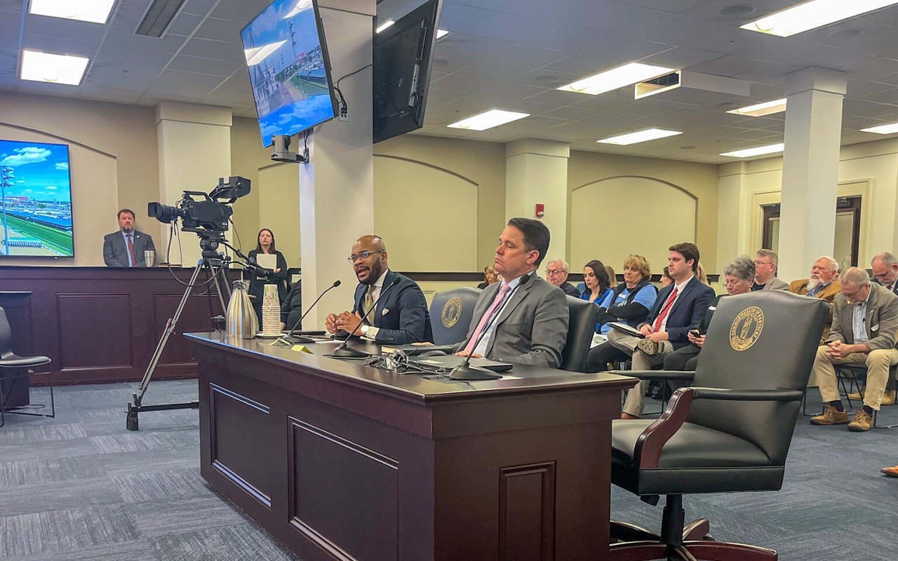 Corrie Shull, the chairman of the JCPS Board of Education, left, speaks as Superintendent Marty Pollio listens during a Kentucky House Education Committee meeting at the Capitol in Frankfort, March 5, 2024.