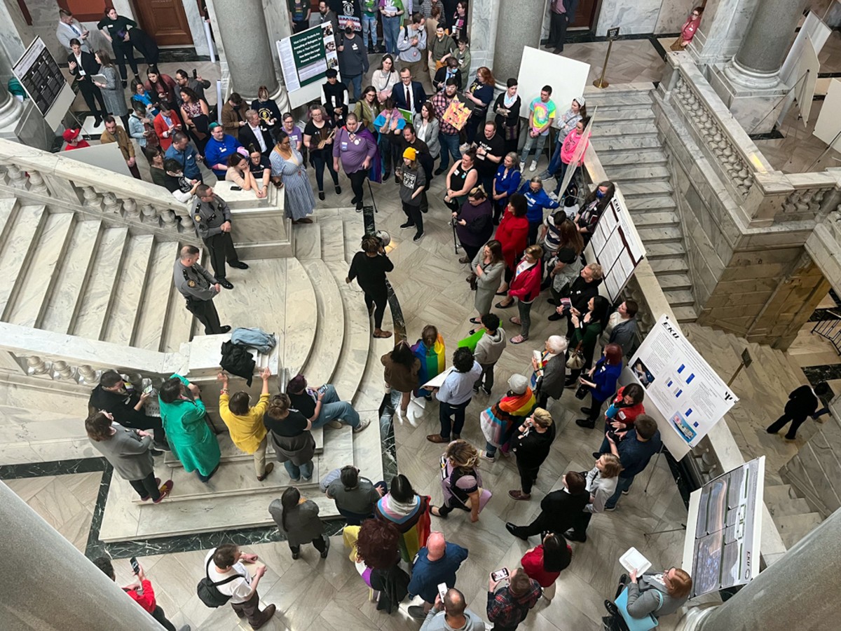 Protesters rally at the foot of the House steps as state representatives debate House Bill 470.