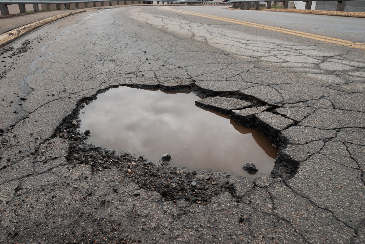 For Louisville to fix potholes faster
If you report a pothole in Louisville today, here are some things that will happen before it gets fixed: Mitch McConnell will leave office, Rand Paul will leave office, Bardstown Road will get a parking garage, and Hometown Rising will come back.
Photo by Carolyn Brown