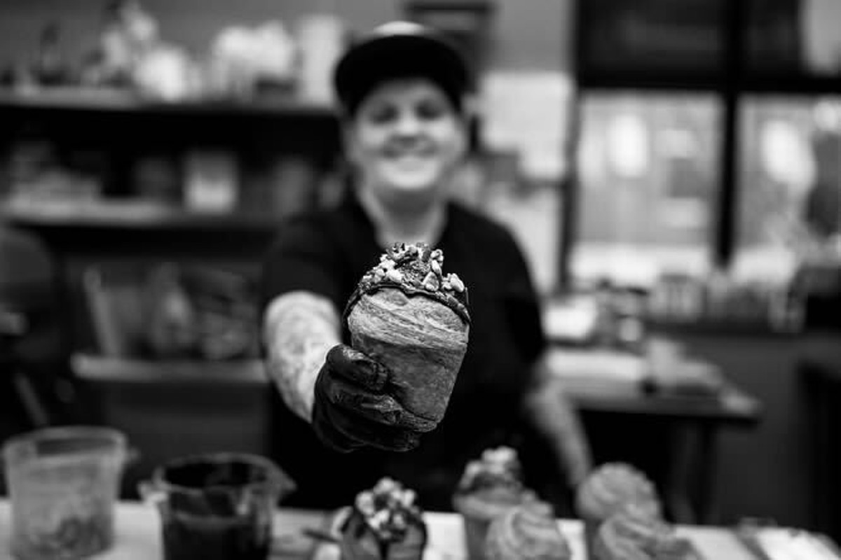 Pastry Chef Amanda Johnson shows off one of her creations. We're not drooling, you are.