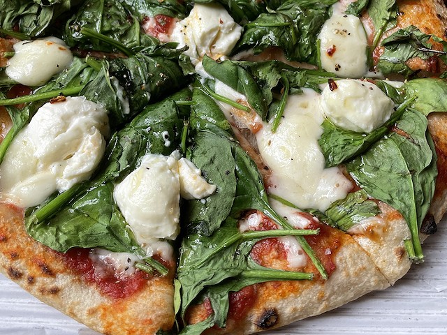 Built on outstanding fresh-milled grain crust and fired with pretty browned leopard spots, this 9-inch MozzaPi pizza is topped with fresh spinach, mozzarella and ricotta and a spicy fresh tomato sauce.