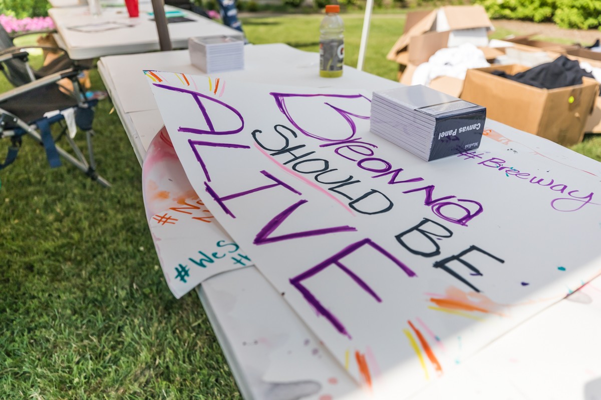 Participants created signs, paintings and used sidewalk chalk 
    at the event on Saturday.  |  Photos by Kathrnyn Harrington.