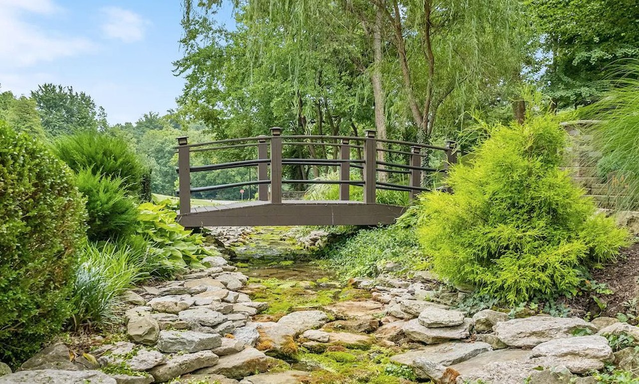 PHOTOS: This 1910 Highlands Mansion With A Creek Sits Next To Cherokee Park