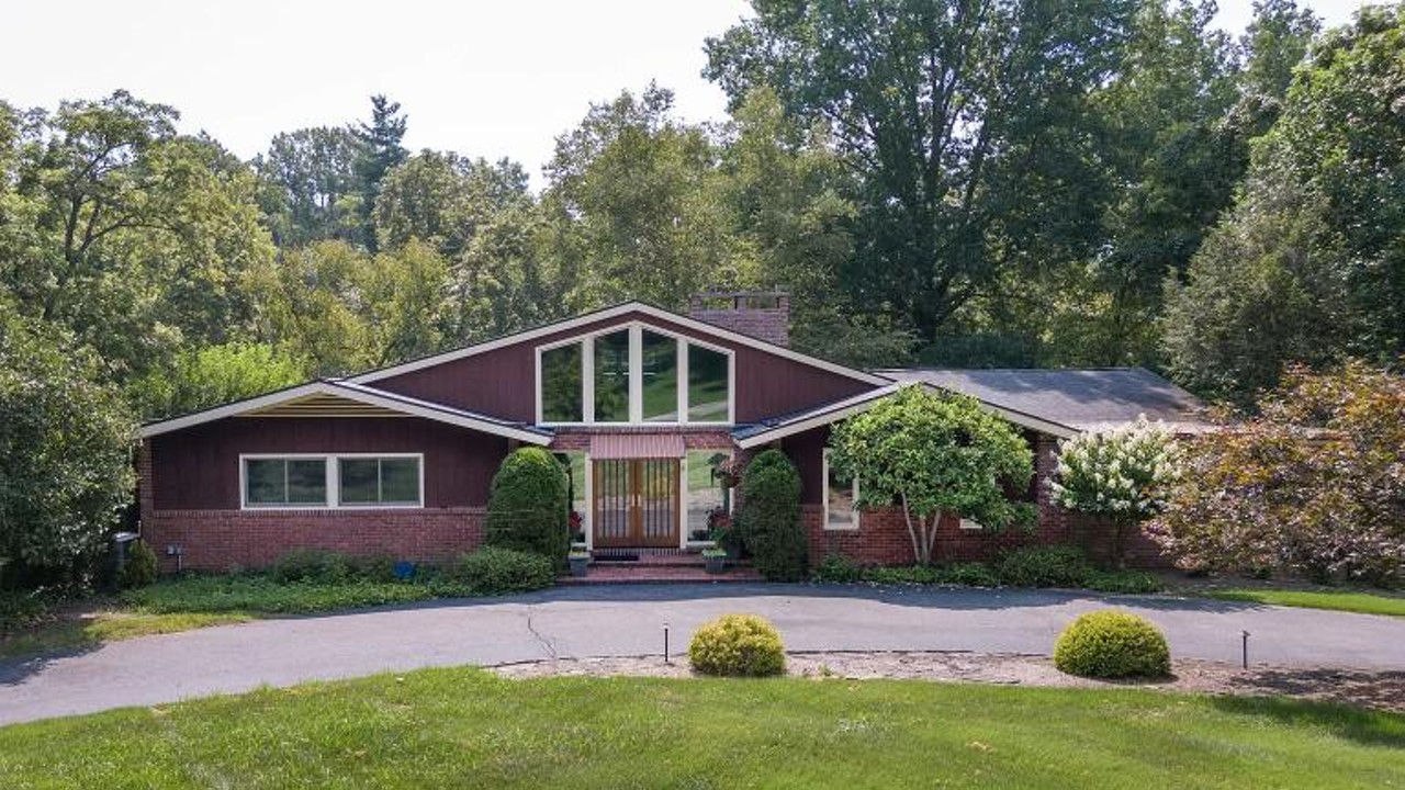 [Photos] This 5 Bdr. Mid-Century House In Louisville Has The Biggest Wine Room We've Seen