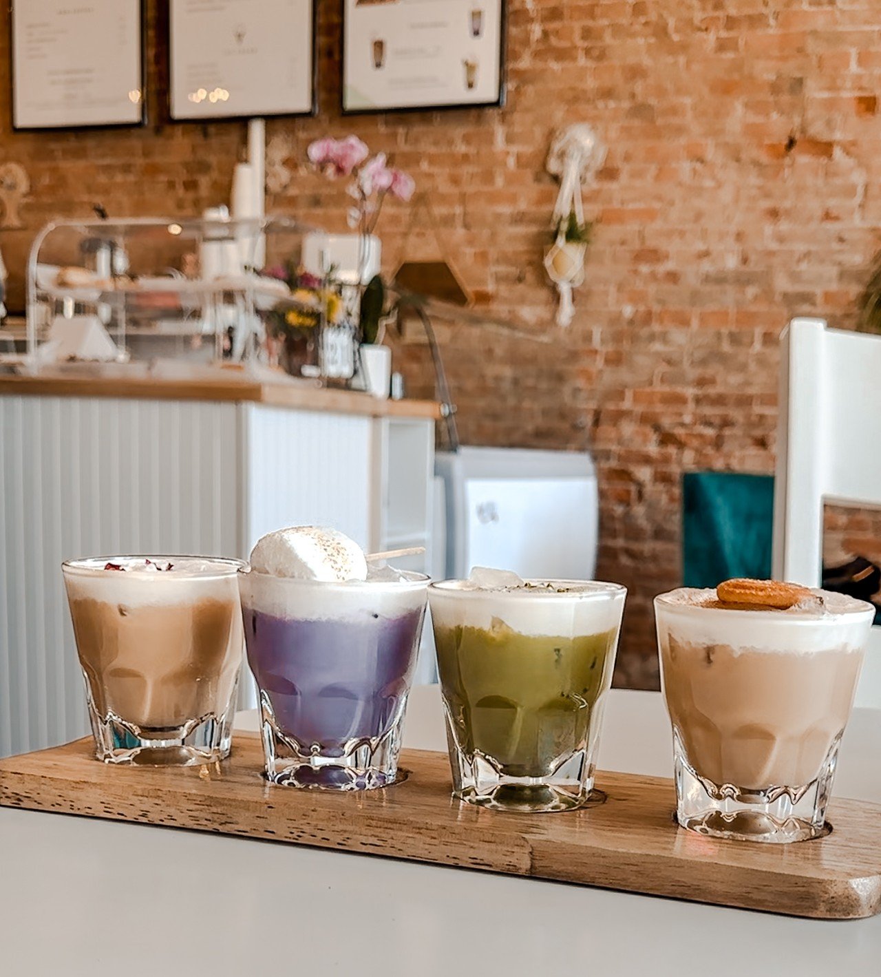 The iced coffee flight includes matcha, butterscotch, ube and strawberry-rose lattes.