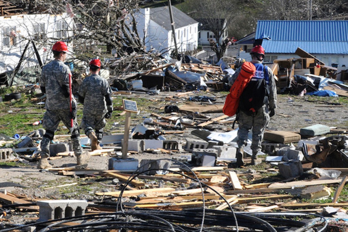 Kentucky National Guard members search for tornado survivors in West Liberty, Kentucky