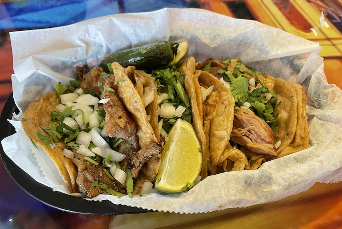 Three hefty tacos at El Mariachi, one of our critic's favorite taquerias.