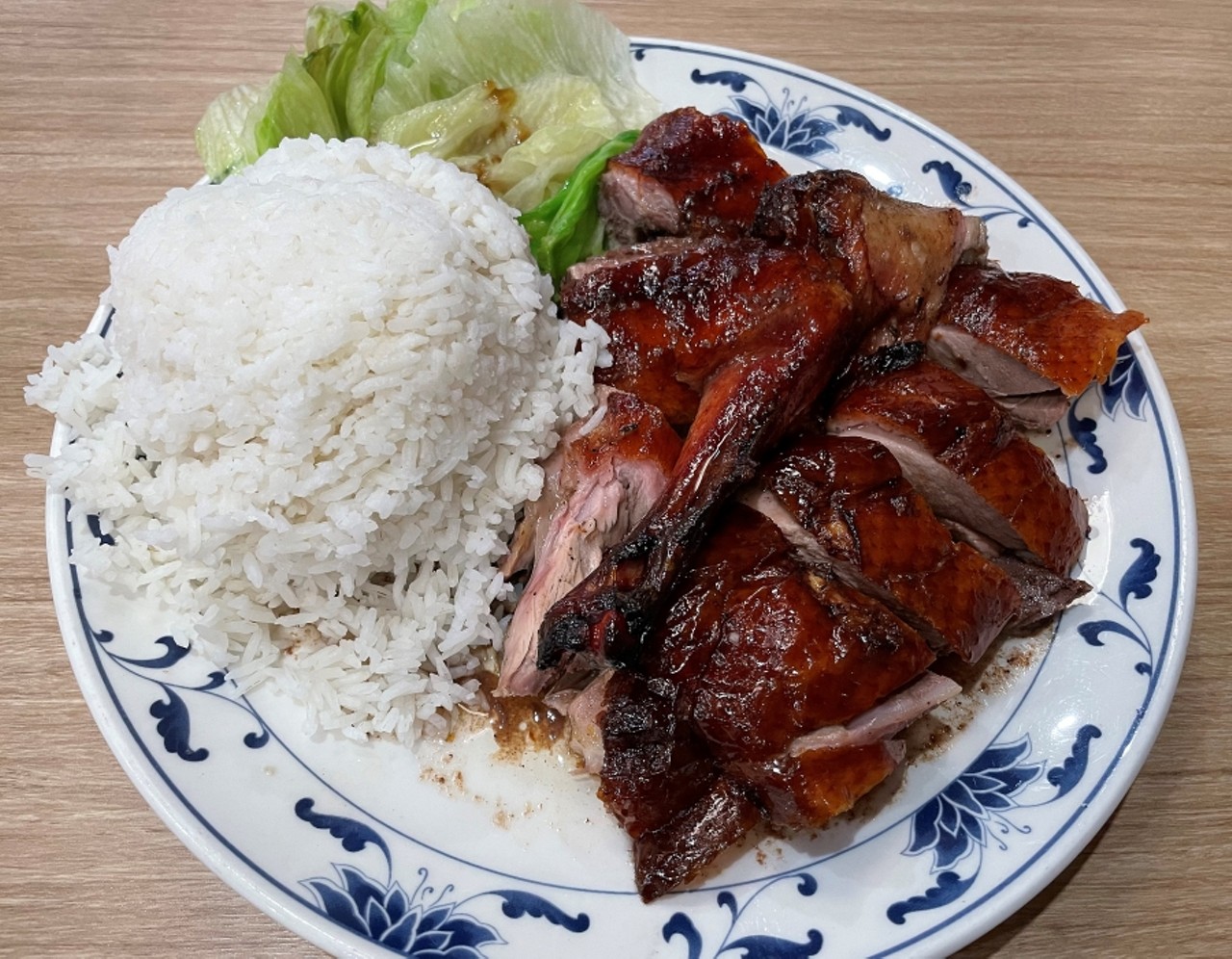  Oriental House 
4302 Shelbyville Road
Review:  &#147;Oriental House Returns&#133; And Is Just As Good As Ever&#148; 
Recommended: &#147;One of our favorite dishes here is a simple but memorable plate of roasted duck with steamed rice. A sizable duck thigh quarter had been coated with hoisin sauce and anise-scented five-spice and roasted to a dark mahogany color, then chopped crosswise into chunks. They were served with a bit of lettuce that had been quickly softened in duck broth, with a generous scoop of medium-grain white rice. The skin was roasted and firm, not crackling crisp, with a thick layer of juicy fat cloaking rich, succulent, tender dark duck meat.&#148;
Photo by Robin Garr