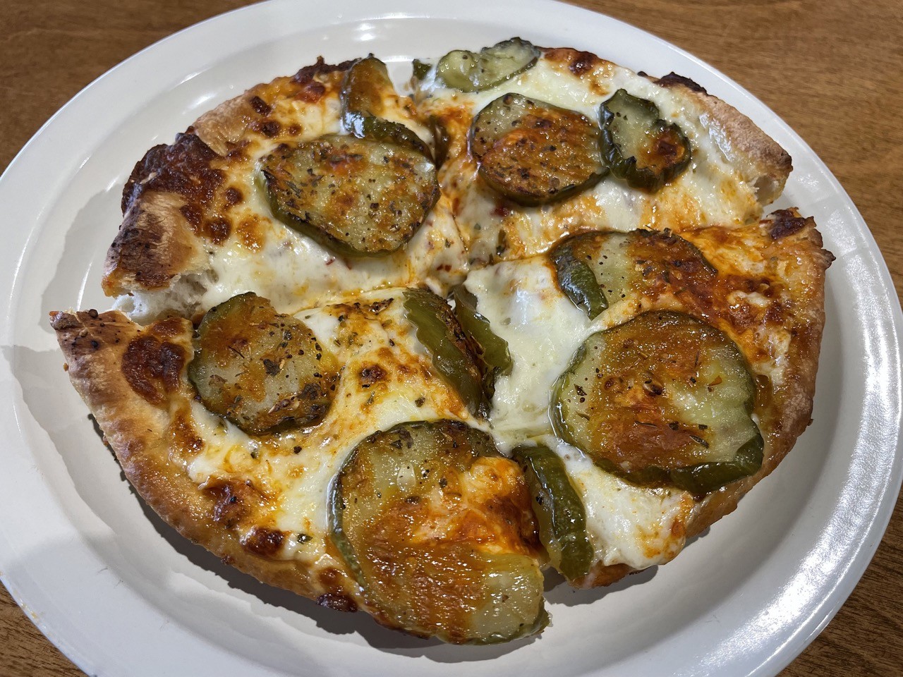 Craft House Pizza
4041 Preston Highway, 12607 Taylorsville Rd., 9601 Newbridge Rd., 2813 N. Hurstbourne Parkway 
Review: We Pick A Plate Of Pickle Pizza At Craft House
Recommended: "Let&#146;s talk about that pickle pie. They had me at Habagardil: I&#146;ve been a fan of the local Pop&#146;s Pepper Patch product for years, and the spicy level is just right for me. Not too mild, yet not fiery enough to hurt. An individual pizza ($7) with the traditional thick crust, not deep-dish thick but not foldably thin either, was crisp and crackery with good toasty flavor. It was spread with a dollop of creamy, tangy ranch dressing, topped with eight or ten spicy Habagardil slices, drizzled with fiery Buffalo sauce and sprinkled with hot red pepper flakes. Authentic Italian it&#146;s certainly not, but I loved the flavor and texture combination. I would do it again, without shame.&#148;
