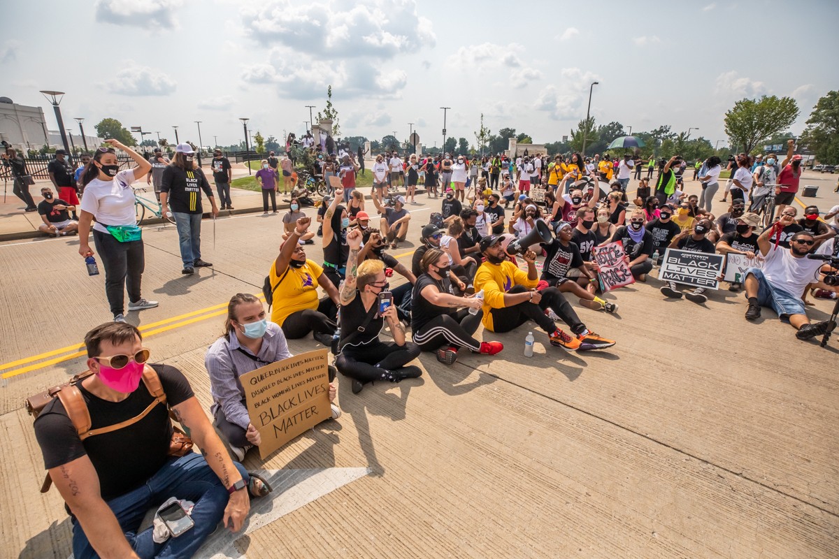 For the &#145;Good Trouble Tuesday&#146; protest, demonstrators gathered on Central Avenue outside of Churchill Downs and sat in the road awaiting arrest.  |  Photo by Kathryn Harrington.