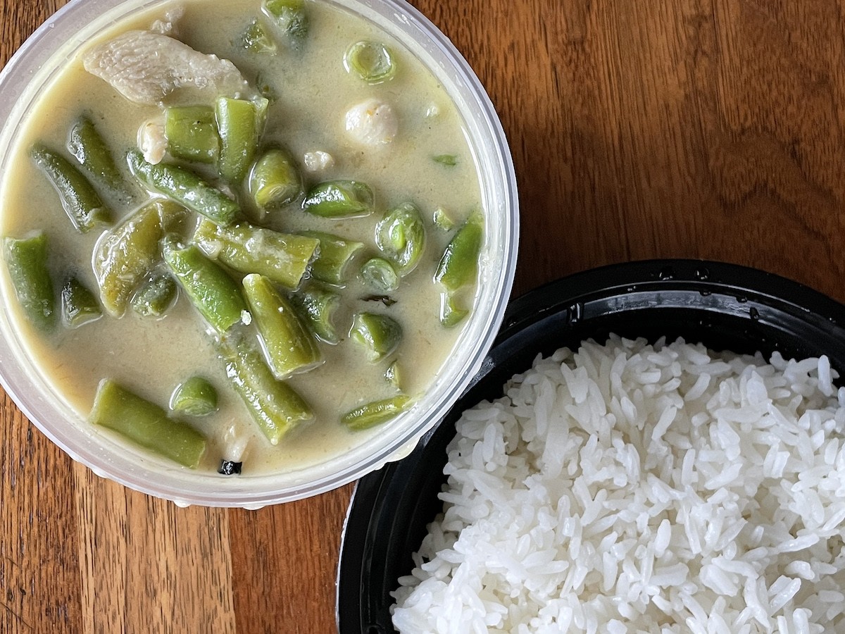 Simply Thai's green curry is just as green as the name implies, filling a gentle greenish broth with fresh green beans.