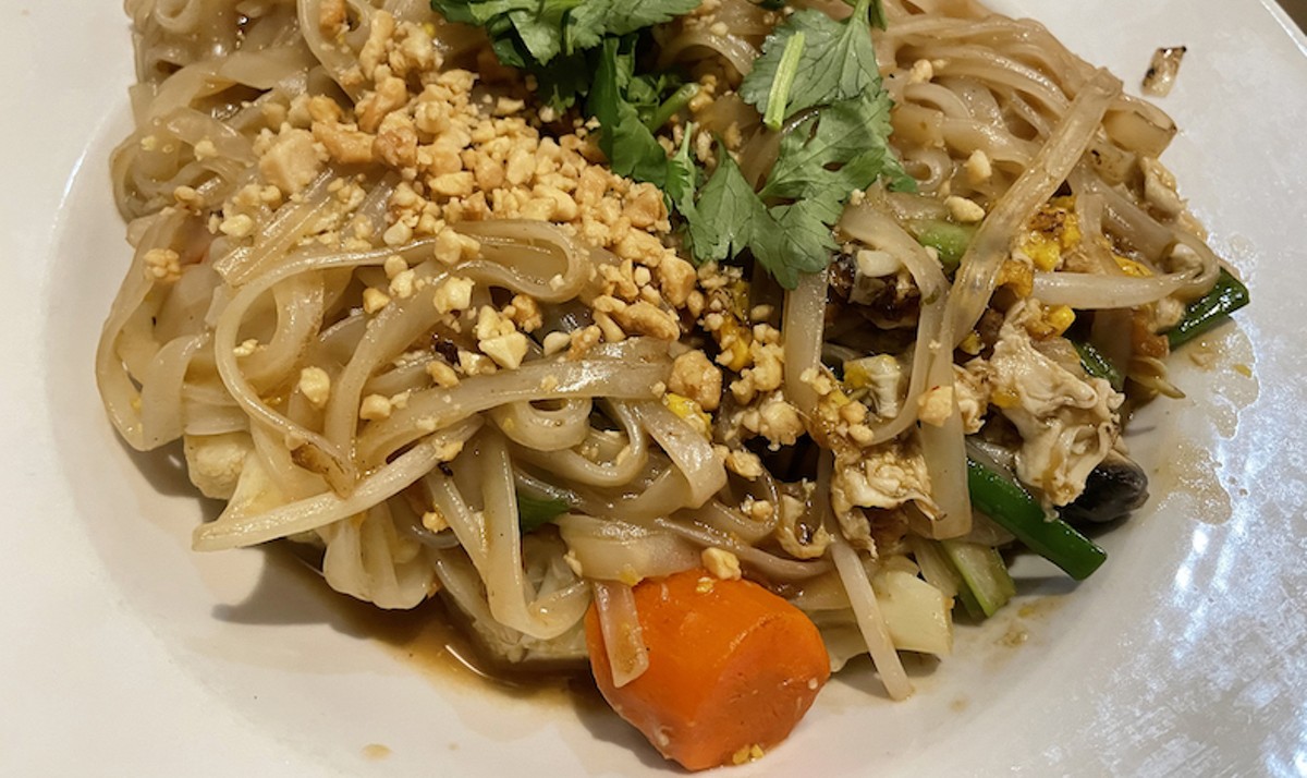 The vegetarian version of pagoda noodles &#150; District 6's Vietnamese take on pad thai &#150; brings a load of tender noodles, peanuts and scrambled egg on a bed of  blanched veggies and fried tofu cubes.