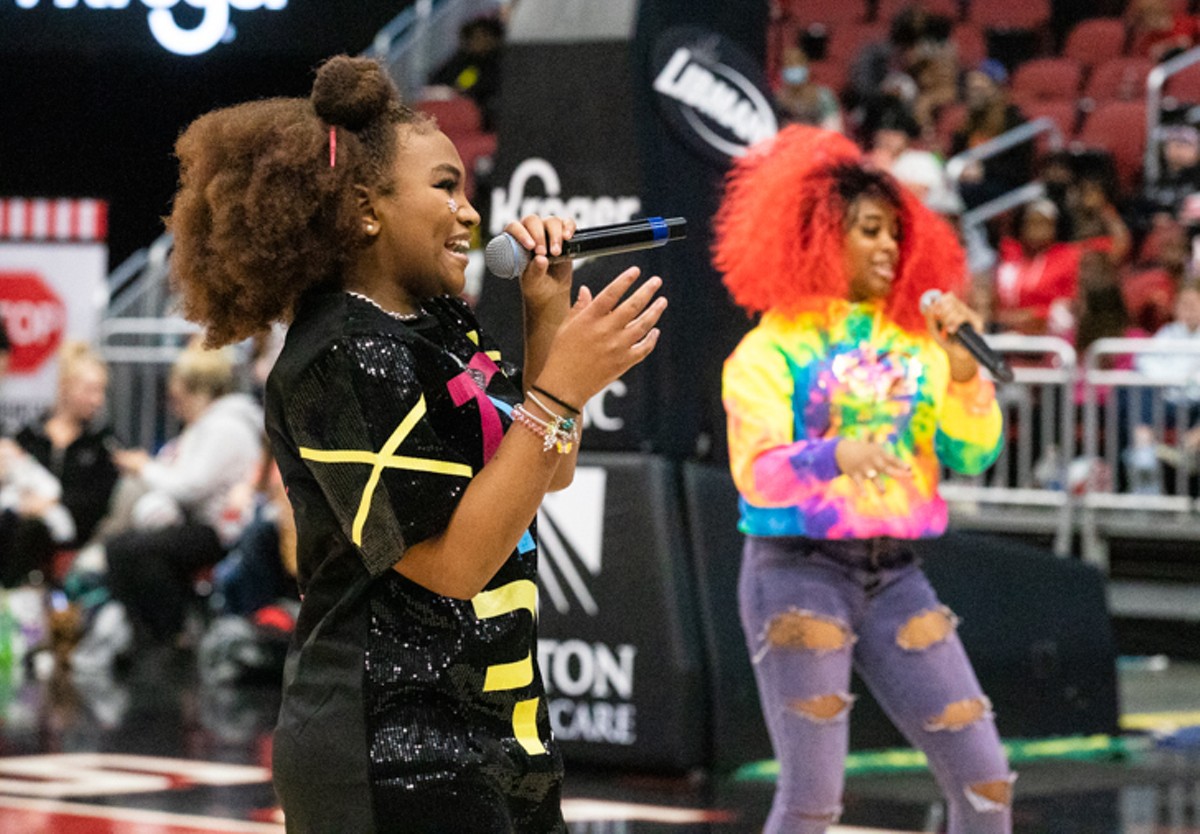 Members of The Real Young Prodigys perform at the halftime of  the Harlem Globetrotters game on January 15, 2022, at the KFC Yum! Center.