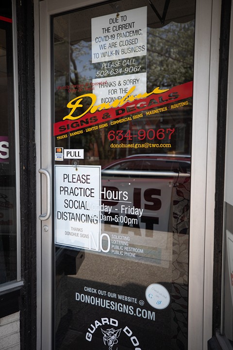 Donohue Signs Inc on First Street encourages social distancing. - KATHRYN HARRINGTON