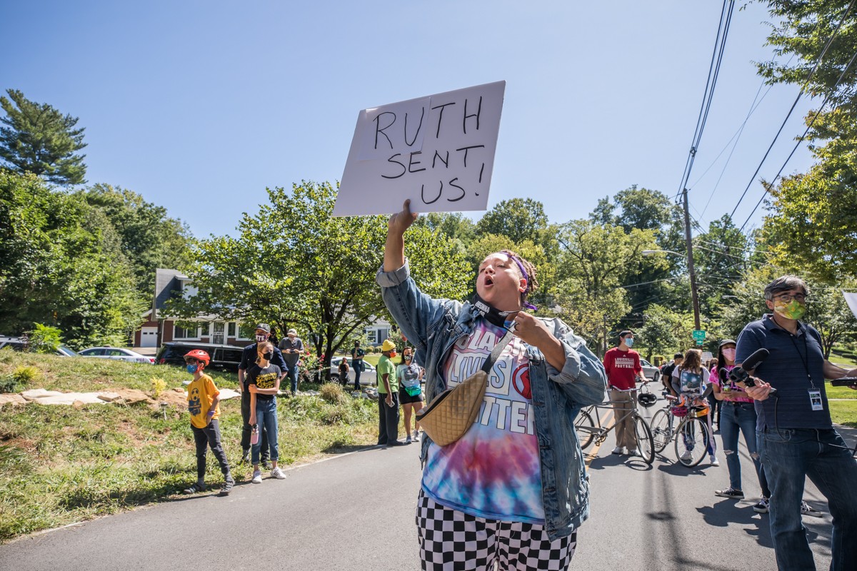 Karen Johnson protested outside of Senator Mitch McConnell's home on Saturday after he vowed to fill the vacant Supreme Court Justice seat following the death of Justice Ruth Bader Ginsburg. - KATHRYN HARRINGTON