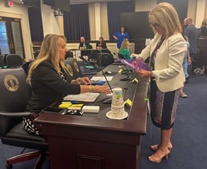 Rep. Stephanie Dietz, R-Edgewood, right, takes part in a &#147;reentry&#148; simulation led by Goodwill Industries of Kentucky. (Kentucky Lantern photo by McKenna Horsley).