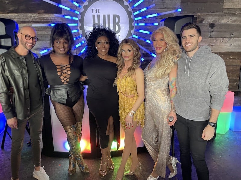 Owners Talmage Collins and Eric Wentworth with performers at The Hub.  | Photo provided.
