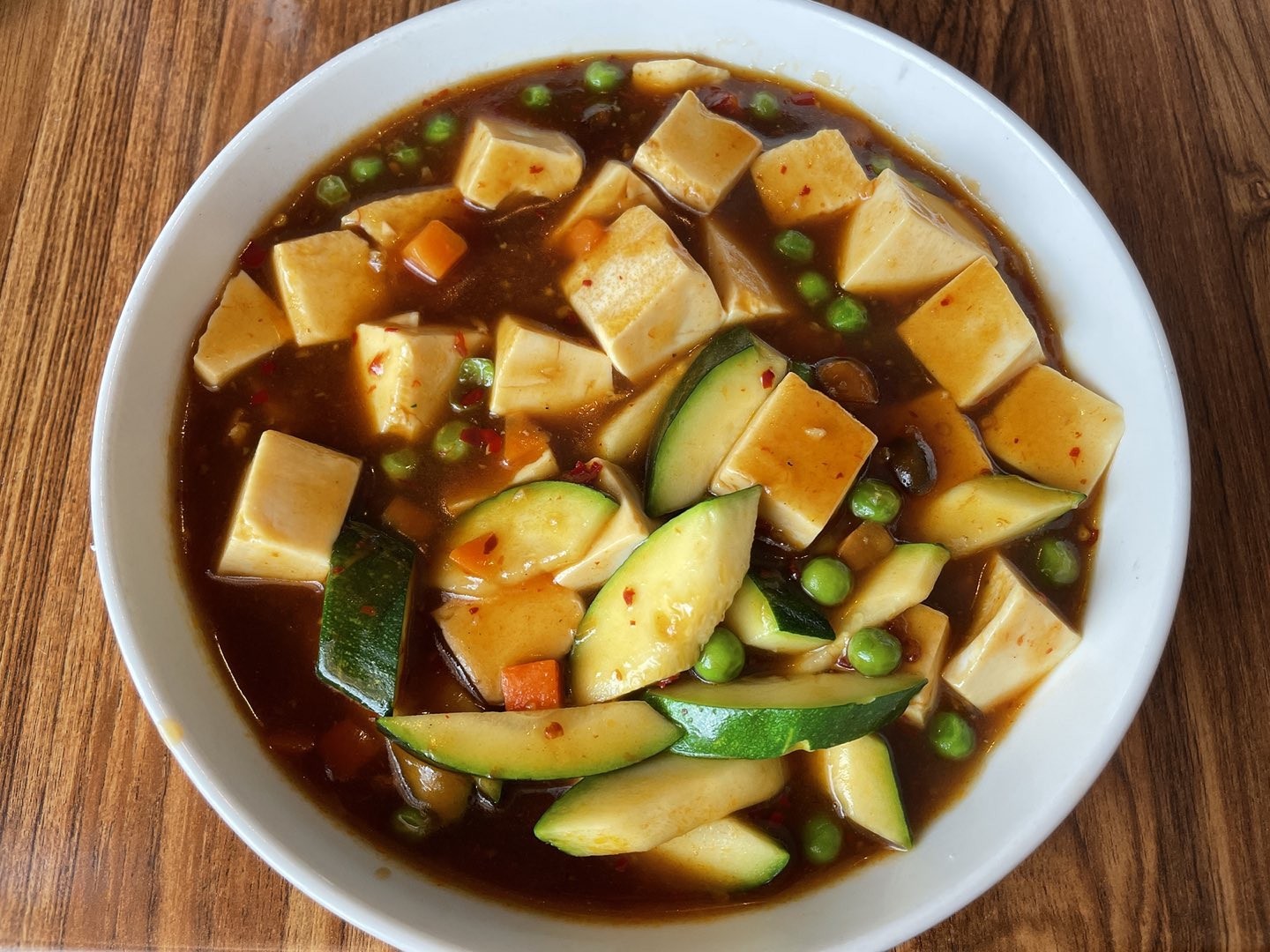 Joy Luck's kung pao tofu is a simple mix of tofu and veggies in a fiery brown-bean sauce.