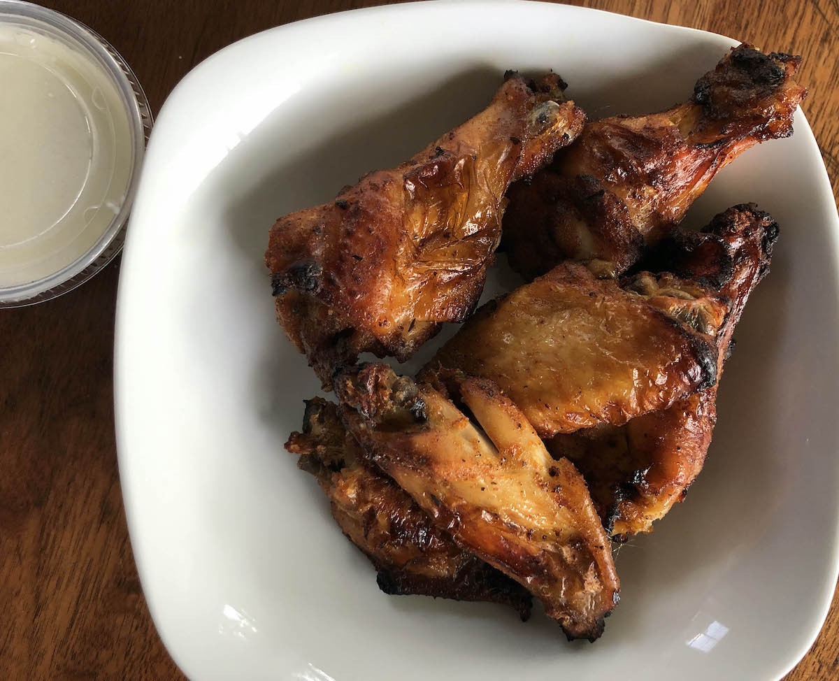 An aromatic dry rub with a whiff of anise and a shattering crisp skin with sweet charred spots - makes Parlour&#146;s wings worth coming back for more.