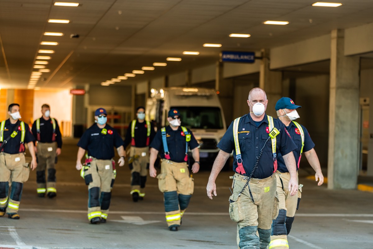 The Louisville Fire Department arrived outside Norton Audubon Hospital's ER entrance to show their support for healthcare workers. - KATHRYN HARRINGTON