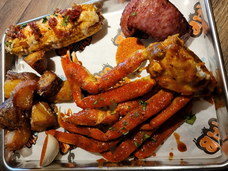 The crab leg platter with Louisville Drip.