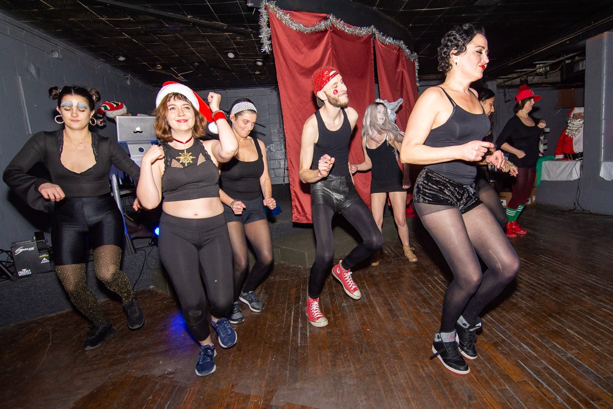 Santa dance troupe opening the show at High Horse Bar. - Nik Vechery