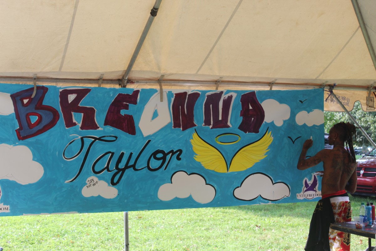 Local artists at  BreonnaCon painted a mural in honor of Breonna Taylor. | Photo by Kaelan Davis. - Kaelan Davis