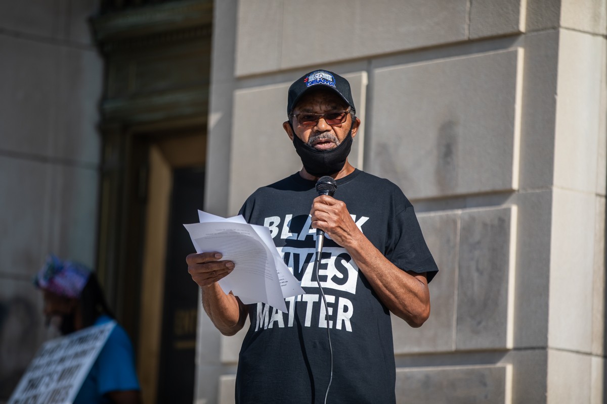 Robert Henderson spoke on the steps of the Gene Snyder Federal building about the racial injustices committed against the Black community and encouraged religious leaders of all beliefs to stand up for Black lives. - KATHRYN HARRINGTON
