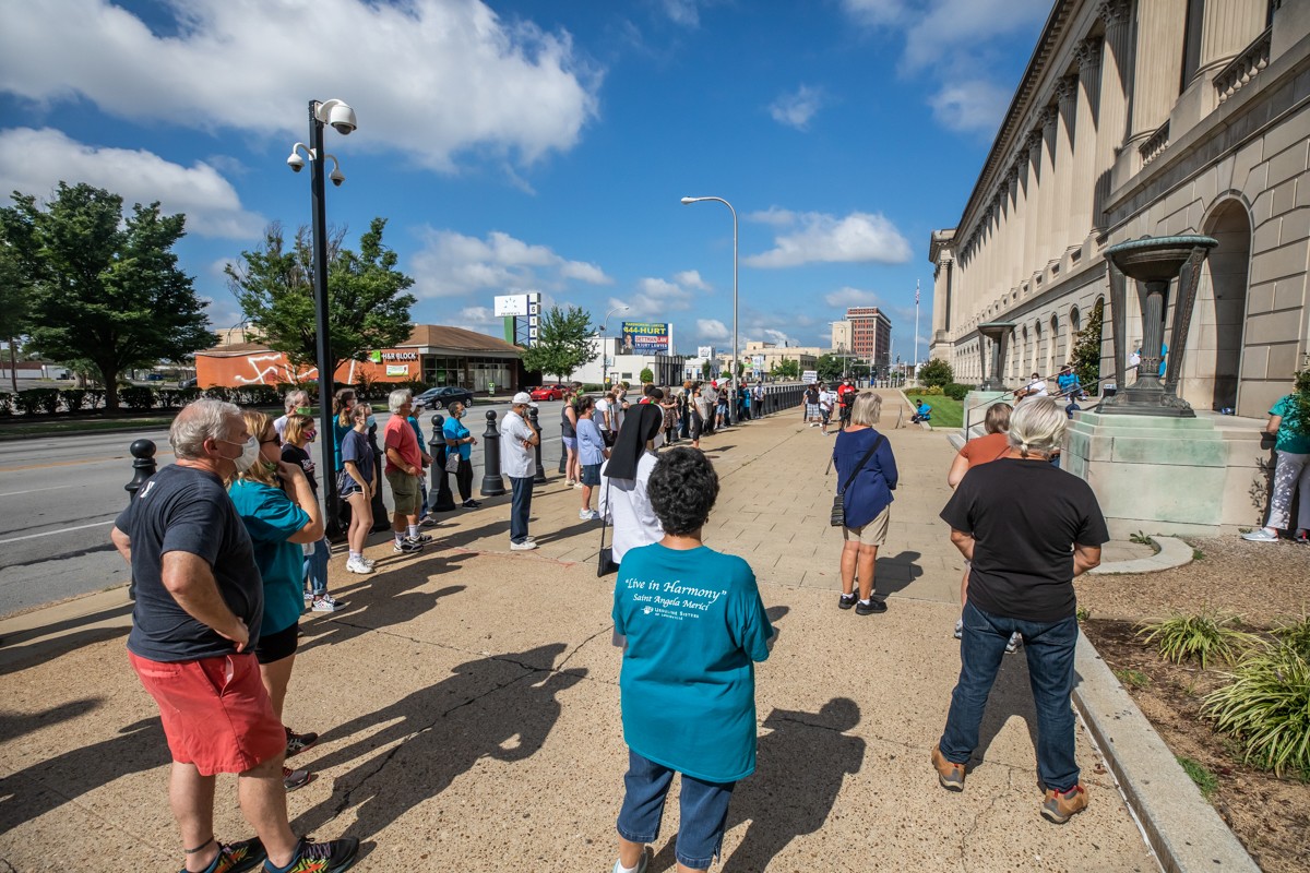The justice walk ended outside of the Gene Snyder Federal building, where several speakers spoke of the racial injustices in America as well as in the Catholic Church and called for change. - KATHRYN HARRINGTON
