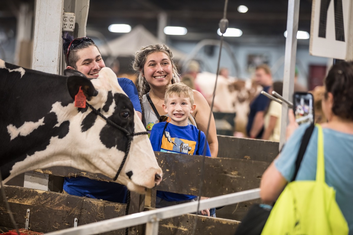 Families gathered to snap photos with a variety of animals at the Kentucky State Fair. - KATHRYN HARRINGTON