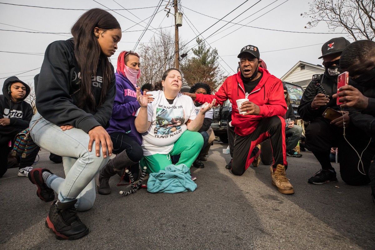 Nagdy &#146;s mother Christina Muimneach was joined by her son&#146;s friends and mourners on Crittenden Drive where he was fatally shot early Monday morning. - KATHRYN HARRINGTON