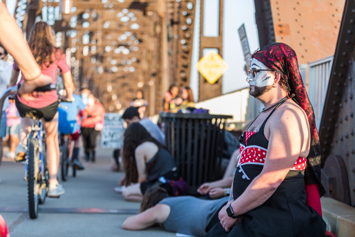 Sister Ida Claire knelt on the Big Four Bridge for 8 minutes and 46 seconds during the vigil. - KATHRYN HARRINGTON