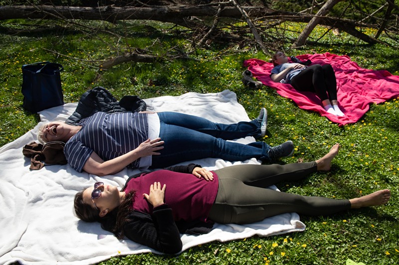 From left: Nancy Headland, Athena Short, and Cassie Harris relax after Psanctuary&#146;s &#147;subtle sacrament encounter&#148; hike.