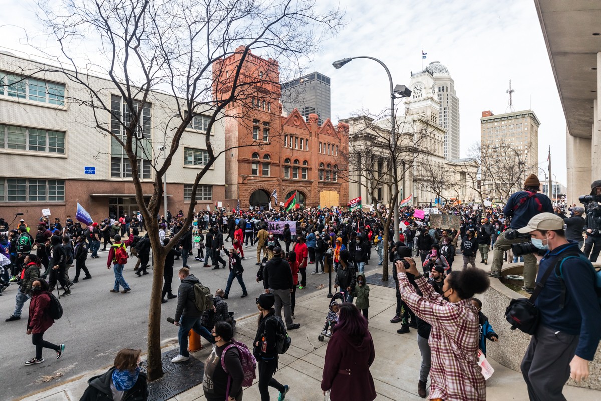 After the rally, hundreds of protesters began to march through downtown. - KATHRYN HARRINGTON